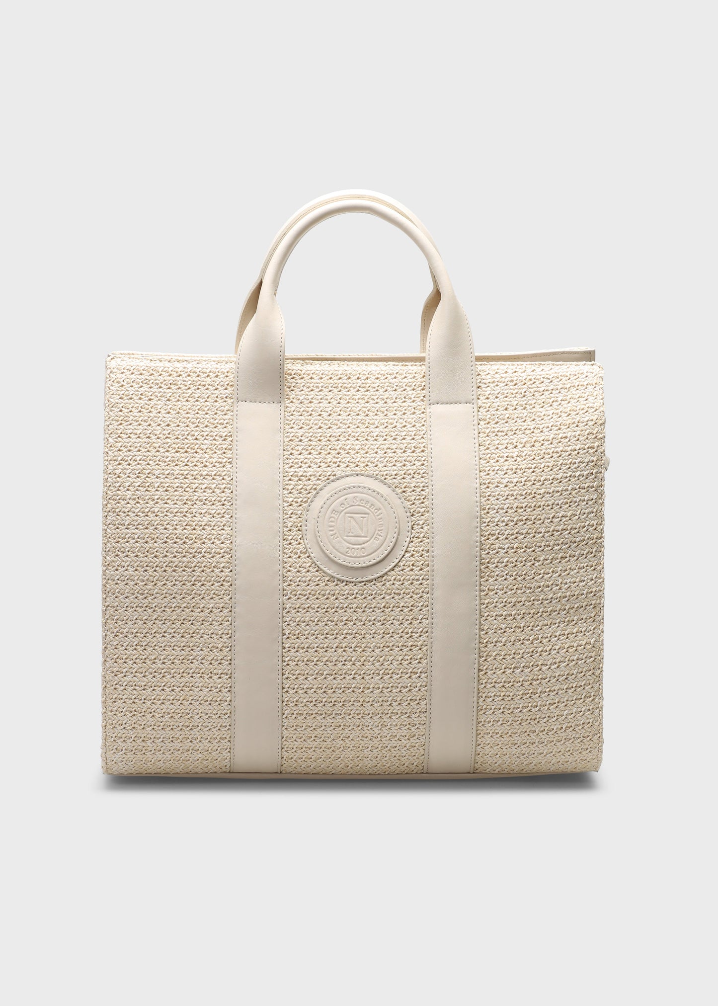 Beige woven handbag with a visible brand logo on a light gray background